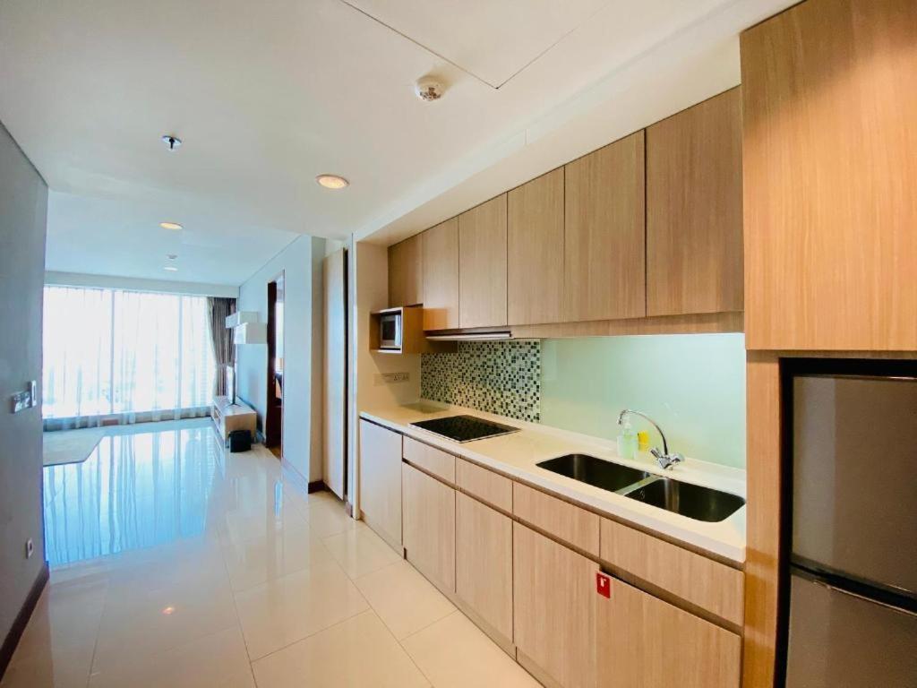 The H Tower Rasuna Suites Kuningan Jakarta By Villaloka Экстерьер фото